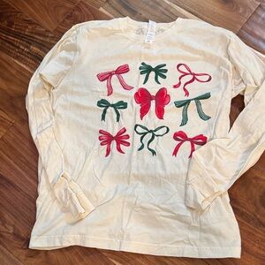 Kids Cream Shirt with Red and Green Bow Design